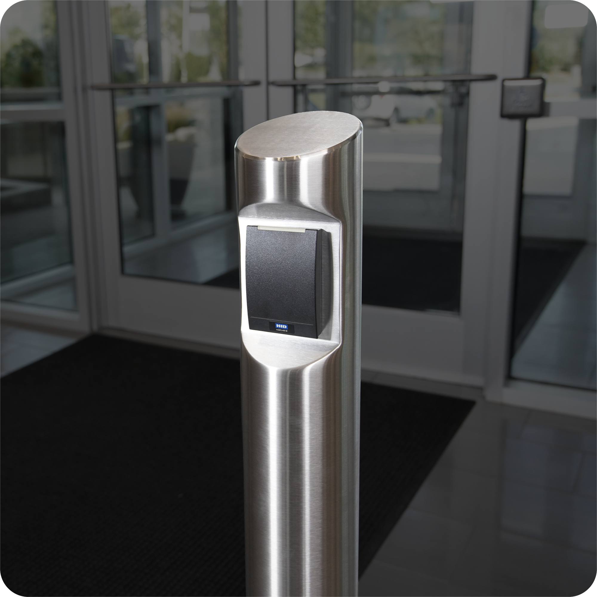 Round stainless steel bollard with card reader