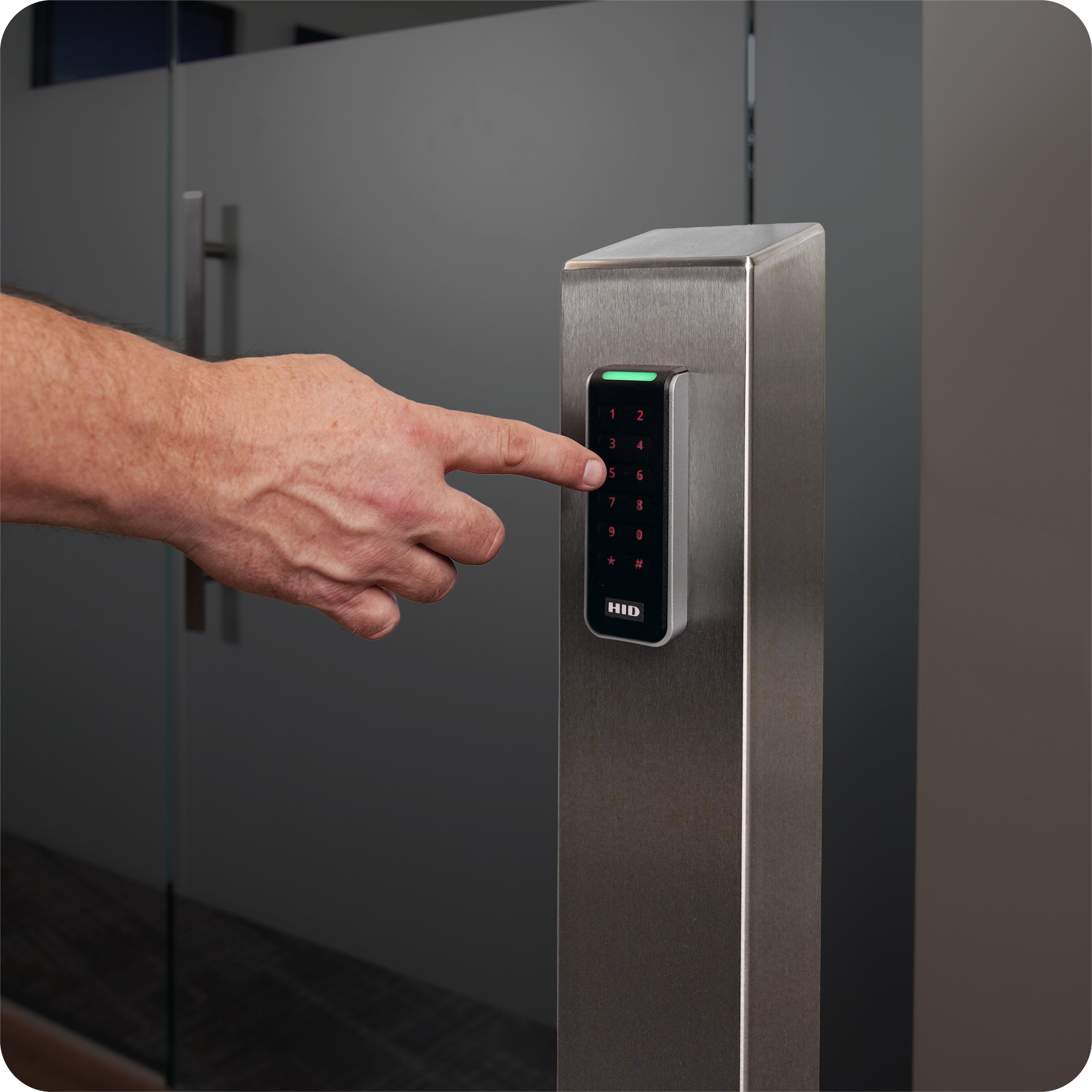 Hand using a lobby pedestal card reader